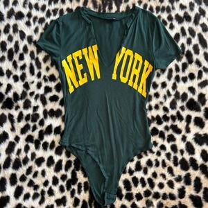Fashion Nova New York Graphic Bodysuit | Green Varsity Y2K Top